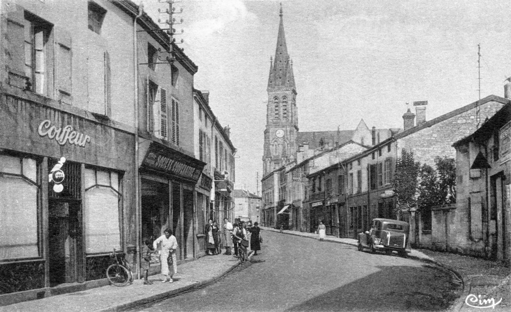 Eurville. La Grande rue dans les années 1930. Carte postale. Collection Mémoire Vive.